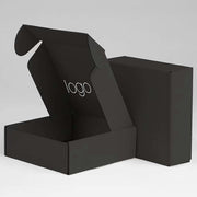 Black Kraft cardboard gift box with glossy lamination, eco-friendly packaging, for food, perfume, watches, jewelry, made from recycled corrugated paper. 