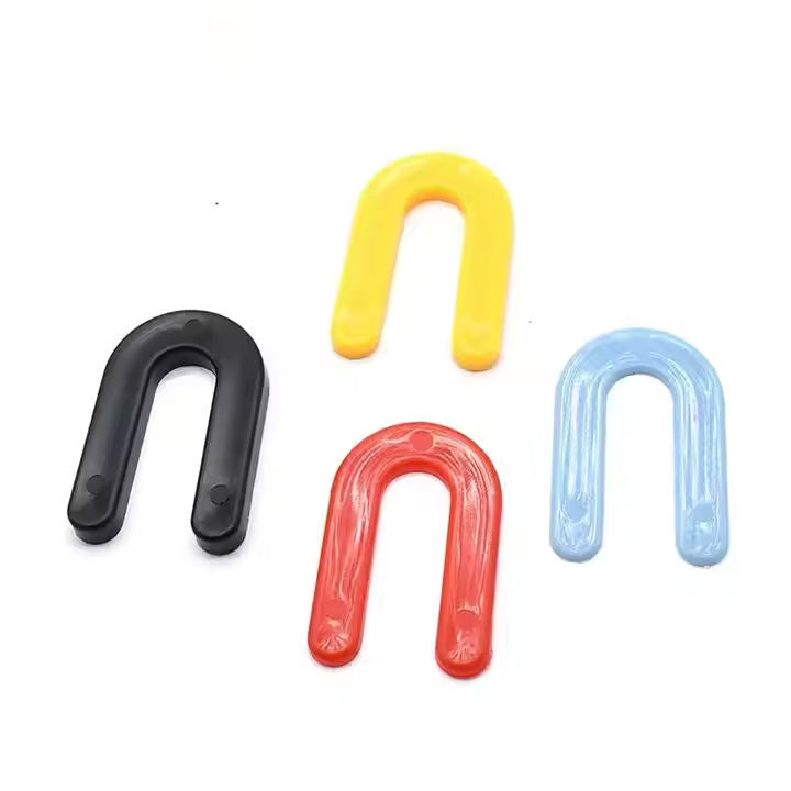 Horseshoe shaped plastic shims for leveling window tiles 