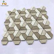 Hexagonal patterned stone mosaic tiles arranged from grey and white trapezoids for floor or wall decoration 