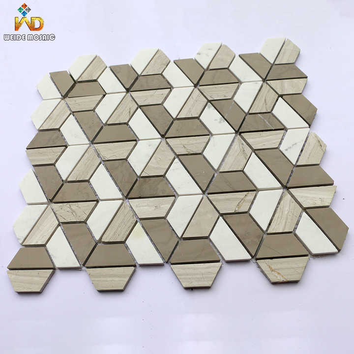 Hexagonal patterned stone mosaic tiles arranged from grey and white trapezoids for floor or wall decoration 