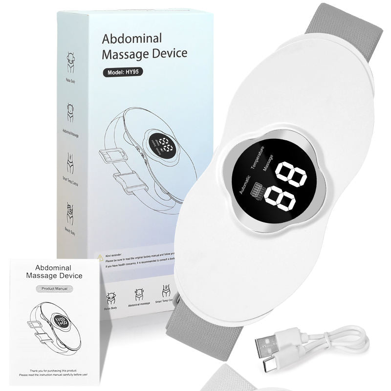 Thiết bị massage bụng màu trắng, màn hình LED đen. Hộp và sách hướng dẫn kèm dây sạc USB.