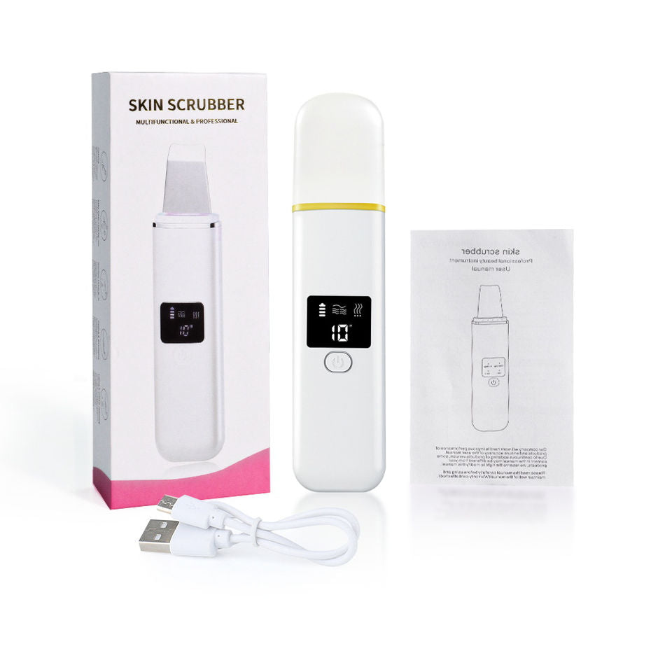 Máy chà da màu trắng, màn hình đen, hộp đựng, dây sạc USB, và hướng dẫn sử dụng.