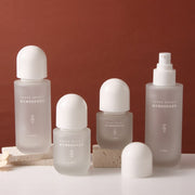 Slim cosmetic glass bottle, thick bottom, transparent, with pump, used for Serum Lotion Cream 