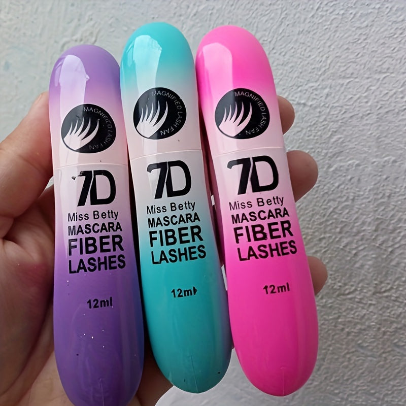 Ba ống mascara với vỏ màu tím, xanh ngọc, hồng, dung tích 12ml, tên "7D Miss Betty".