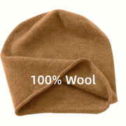Mũ len màu nâu, chất liệu 100% len, với chữ trắng "100% Wool".