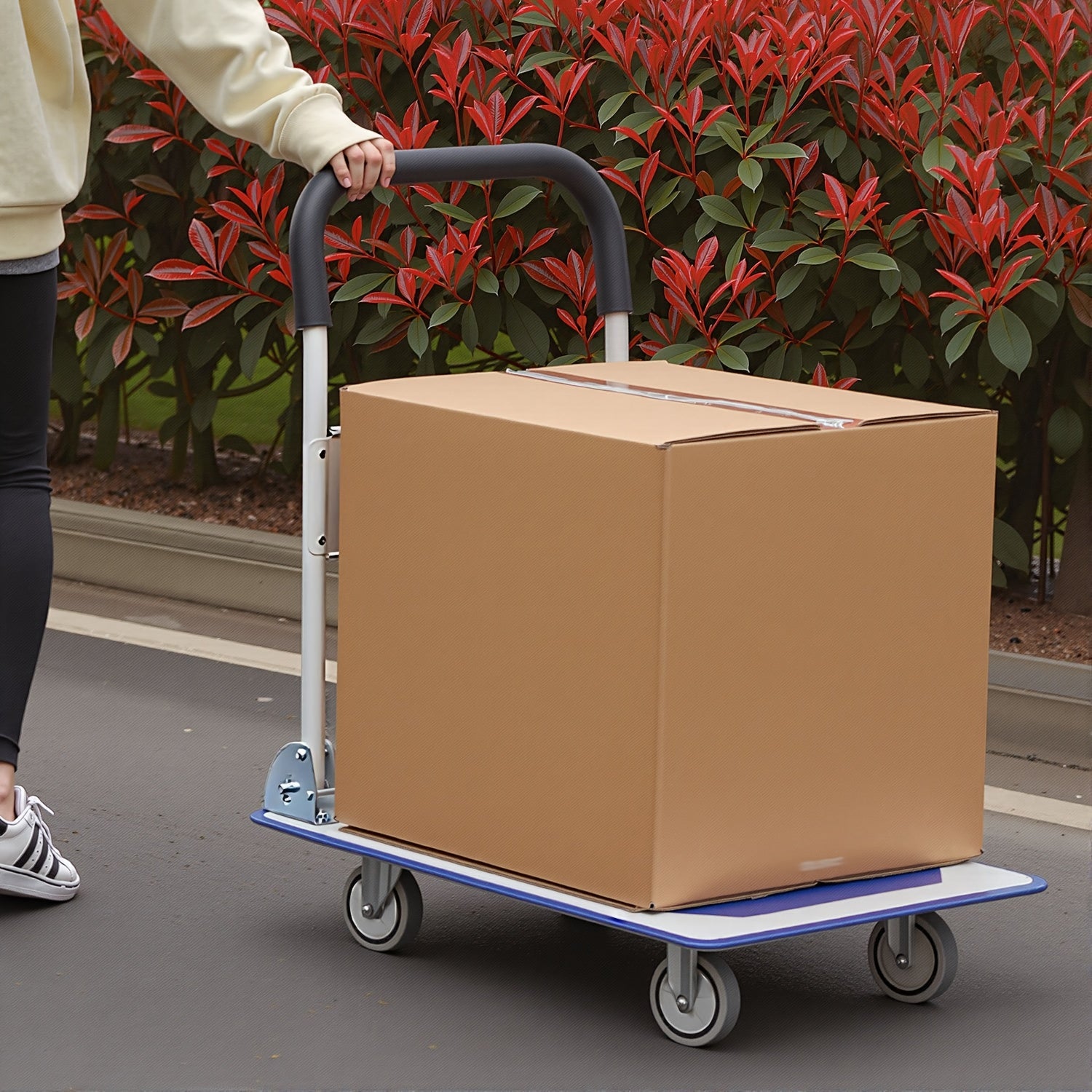 A Foldable Platform Hand Truck With High Load-bearing Capacity, Crafted From Carbon Steel, Features Two 360° Silent Swivel Wheels And Two Fixed Silent Wheels For Easy Transportation Of Boxes, Furniture, And Appliances. Ideal