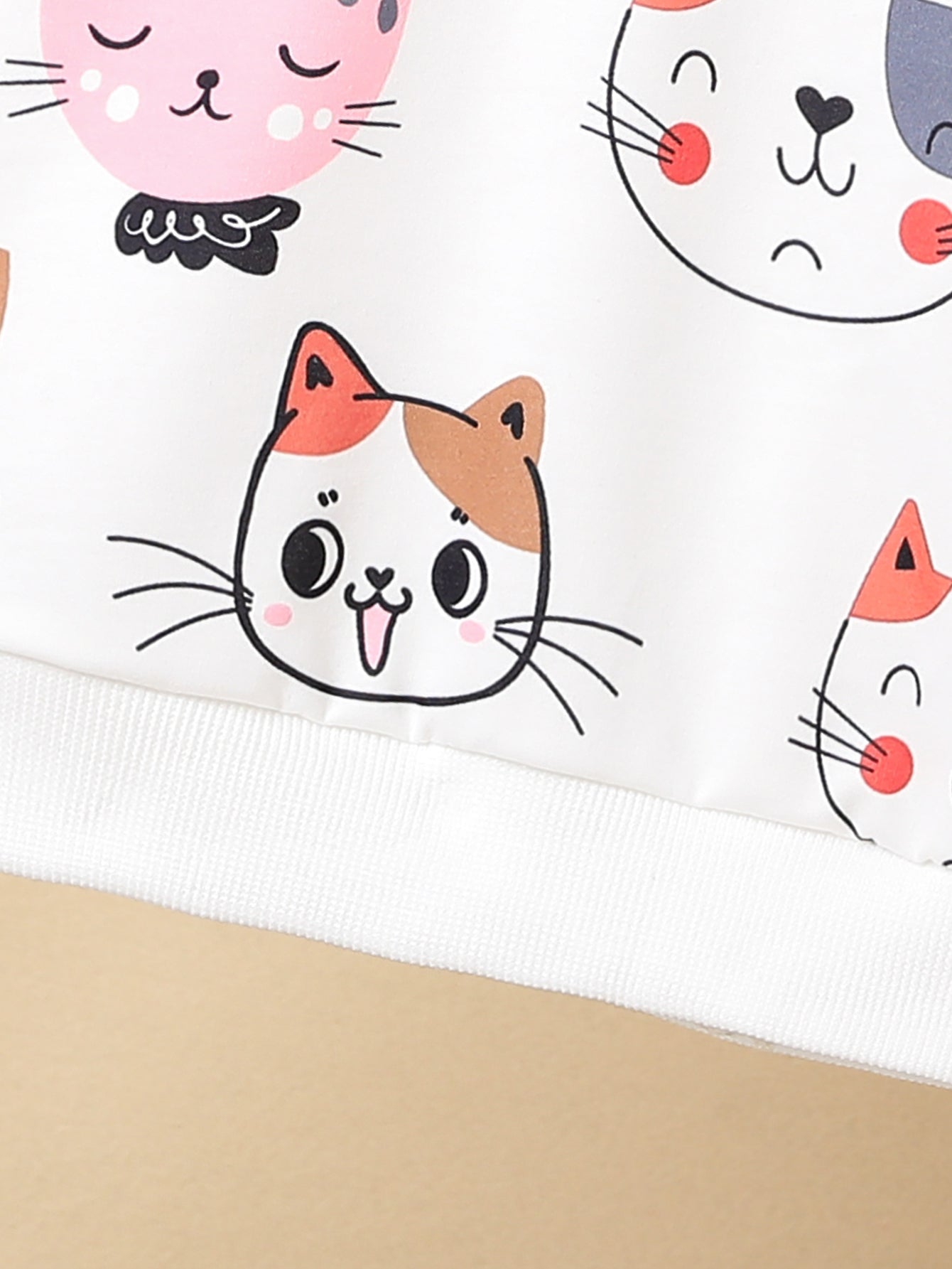 Áo nỉ nữ họa tiết mèo xinh - Hồng nhạt, trẻ trung - Daisan Mart