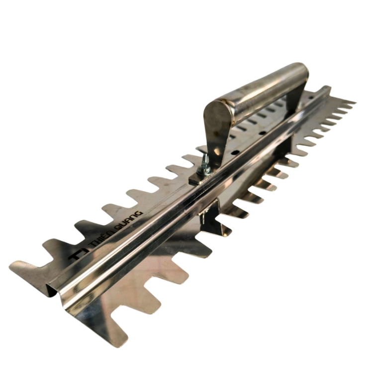 Serrated trowel for wall and floor tiles 