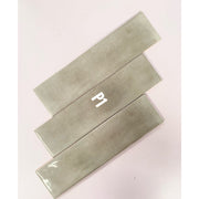 Glossy gray tile with curved surface 75x300mm M7532P1