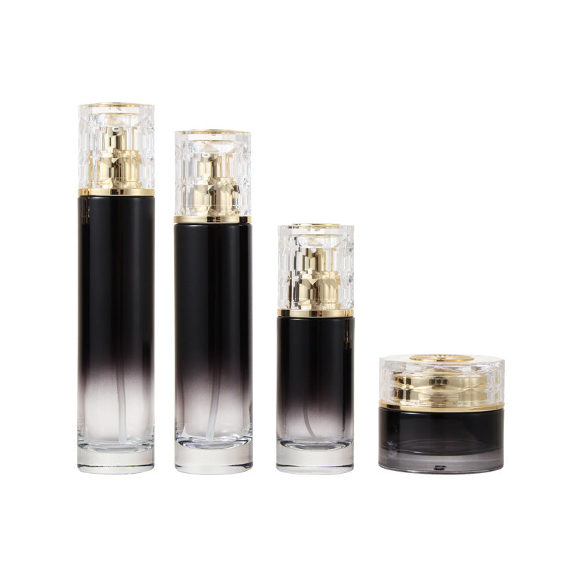 Luxury empty packaging set for facial cream and skin care serum includes 120ml thick bottom black gradient glass bottle and 50g cream jar. 