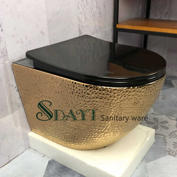 Best selling luxury bathroom gold plated ceramic wall hung toilet 