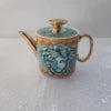High-class Bone China Teapot with Golden Lid and Human Head