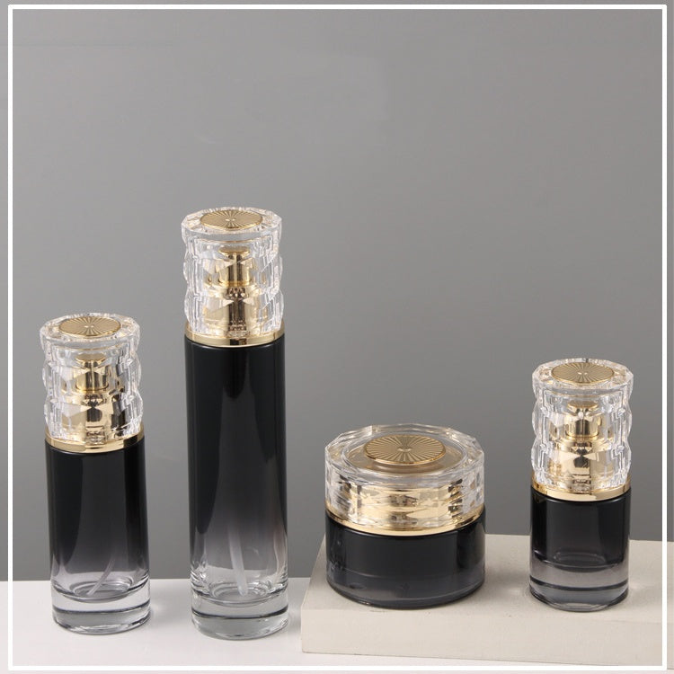 Luxury empty packaging set for facial cream and skin care serum includes 120ml thick bottom black gradient glass bottle and 50g cream jar. 