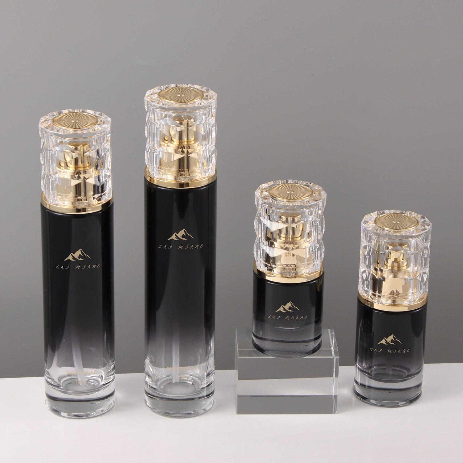 Luxury empty packaging set for facial cream and skin care serum includes 120ml thick bottom black gradient glass bottle and 50g cream jar. 