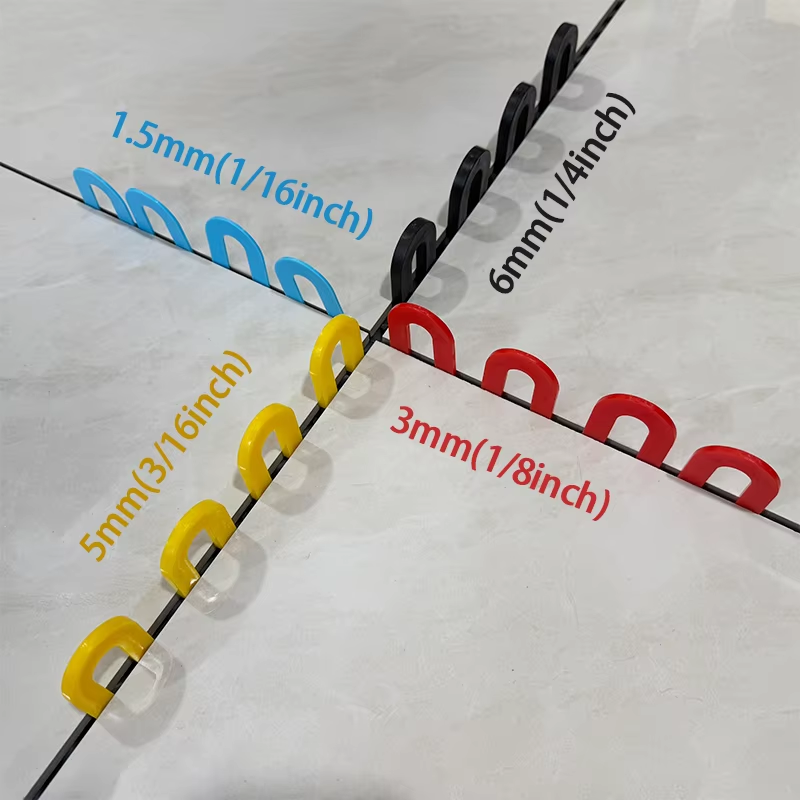 Horseshoe shaped plastic shims for leveling window tiles 
