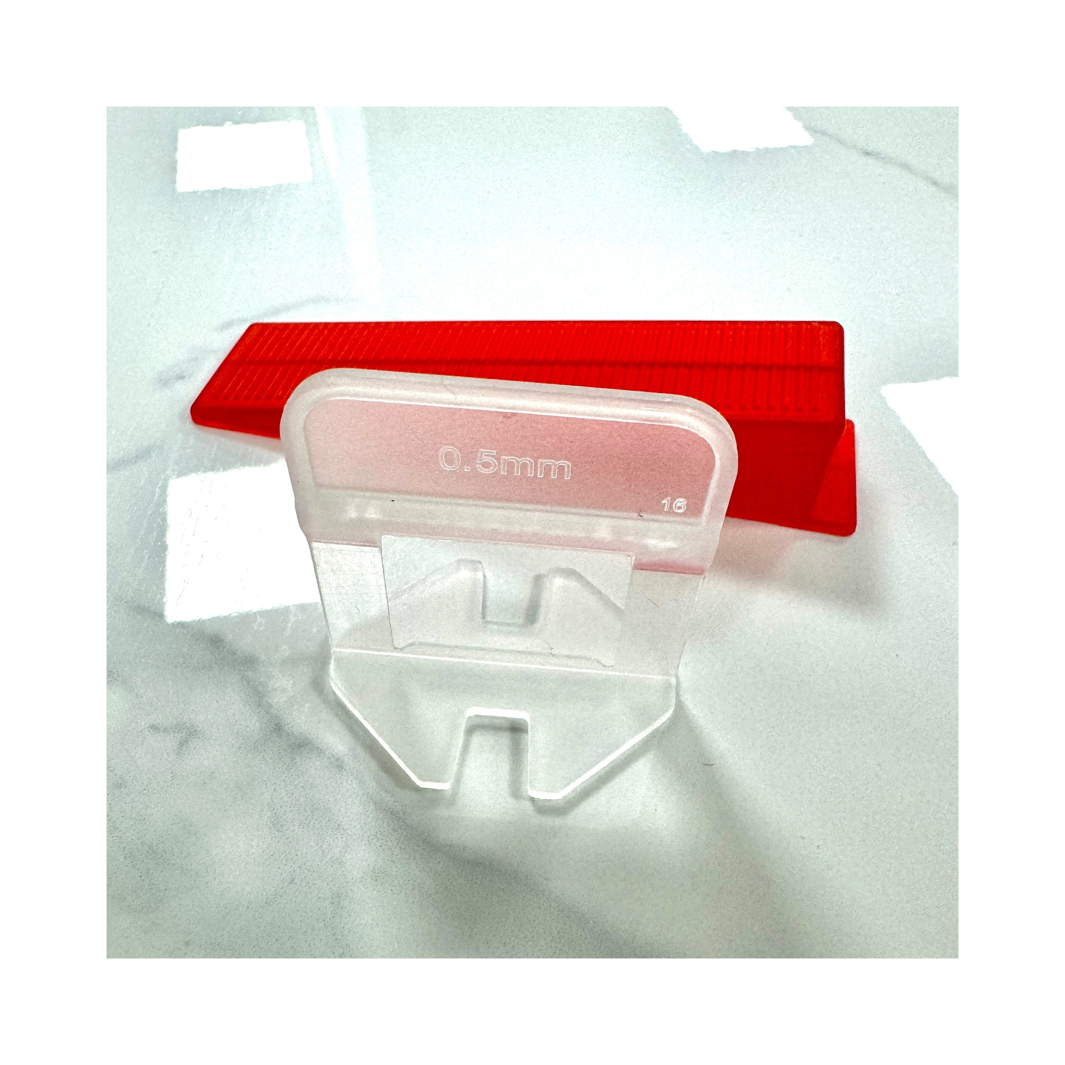 Tile leveling system and accessories, clamps and 0.5mm plastic positioning bars are easy to use 