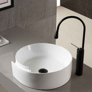 Ceramic splash-proof sink on bathroom countertop 