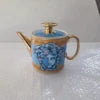 High-class Bone China Teapot with Golden Lid and Human Head