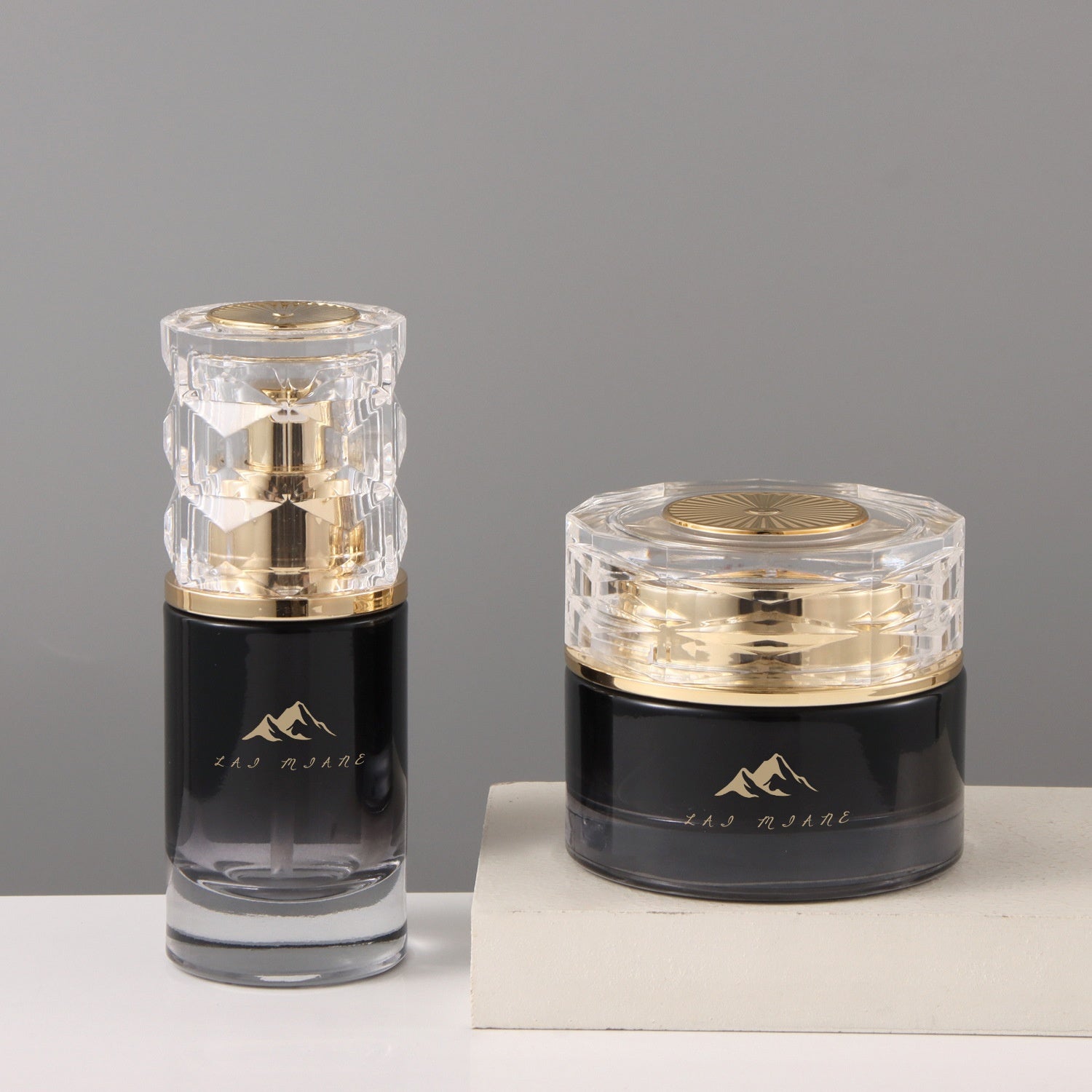 Luxury empty packaging set for facial cream and skin care serum includes 120ml thick bottom black gradient glass bottle and 50g cream jar. 
