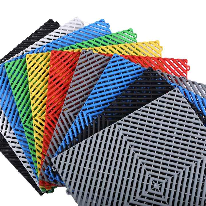 Colorful garage floor tiles, rigid modular, industrial plastic mats for car detailing shop 