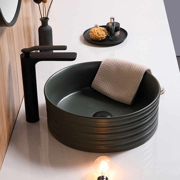 Matte black ceramic round bathroom sink for sale 