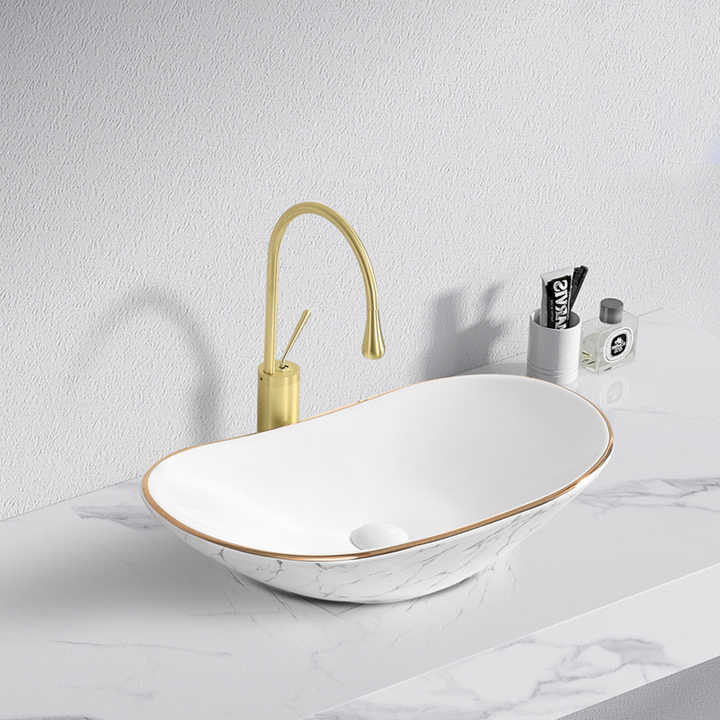 Porcelain sink, faucet, marble color, bathroom, gold wash basin 