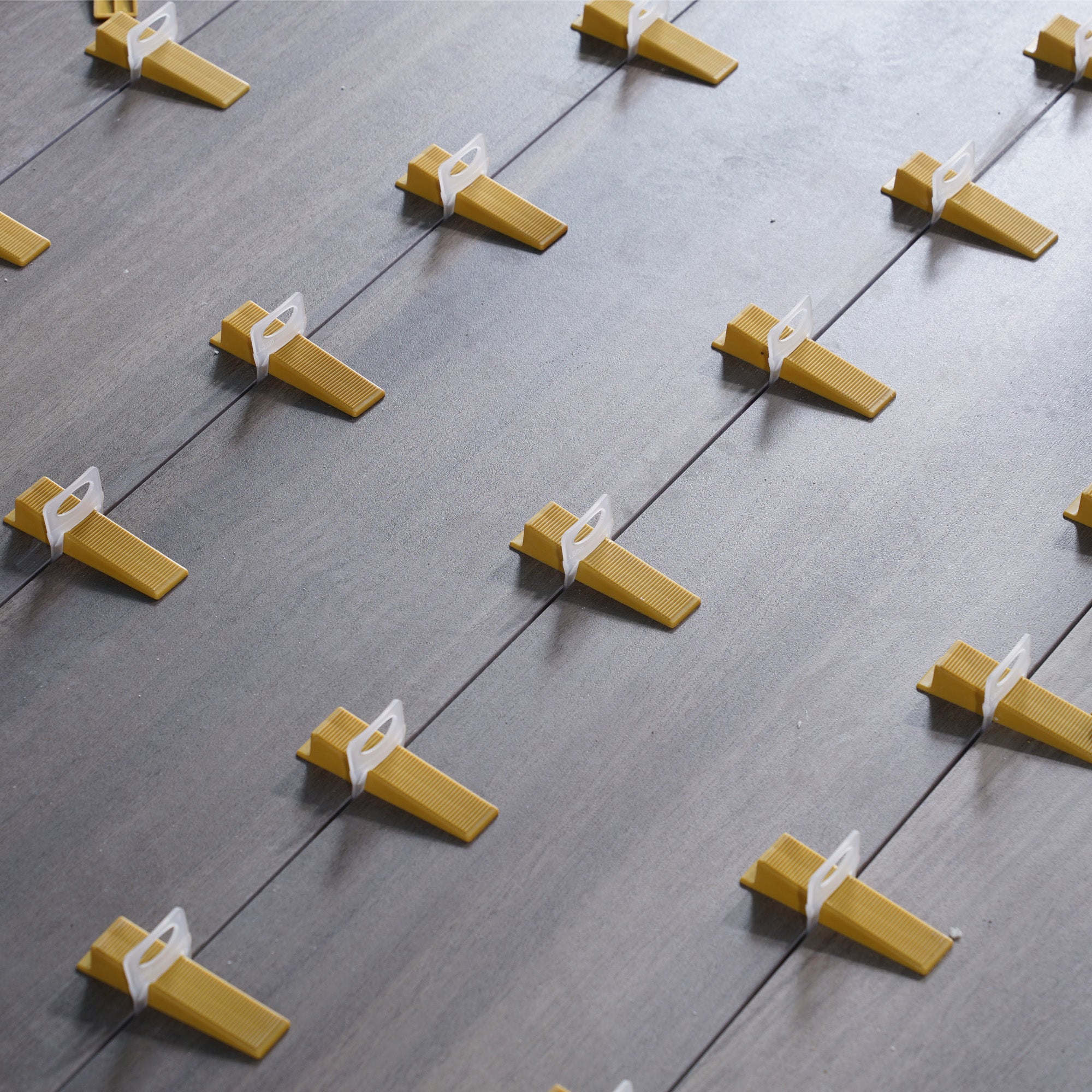 Tiling accessories, clamps to keep the distance when laying tiles 