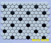 Small white hexagonal mosaic tiles with black dots 