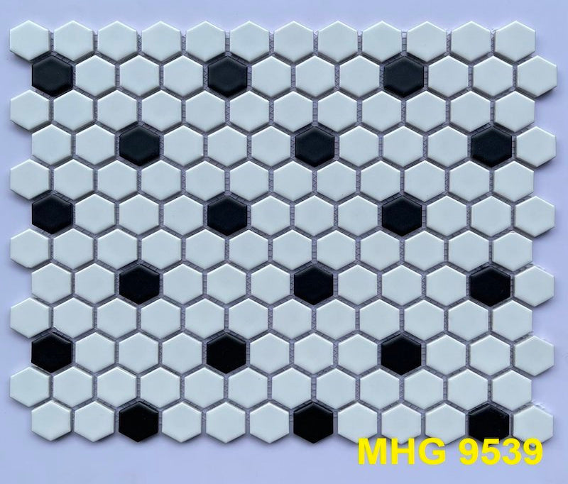 Small white hexagonal mosaic tiles with black dots 
