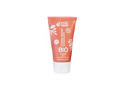 Tuýp kem dưỡng tay màu cam, ghi nhãn "BIO Karité Shea", nắp trắng.