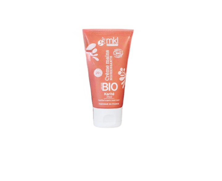 Tuýp kem dưỡng tay màu cam, ghi nhãn "BIO Karité Shea", nắp trắng.