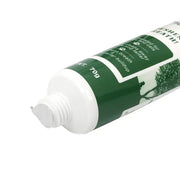 Ống kem màu xanh lá với nắp bạc, dung lượng 70g, có chữ trắng in trên nền xanh.