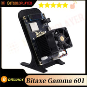 Thiết bị Bitaxe Gamma 601 trên giá đỡ, có quạt tản nhiệt và màn hình nhỏ.