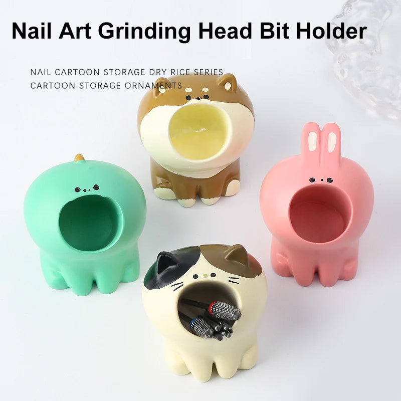 Bốn giá đỡ hình động vật đáng yêu màu xanh, nâu, hồng và trắng để dụng cụ làm móng.