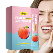 Hộp nước súc miệng vị đào màu hồng xanh, có hình quả đào. Người phụ nữ nhăn mặt, tay ôm má.