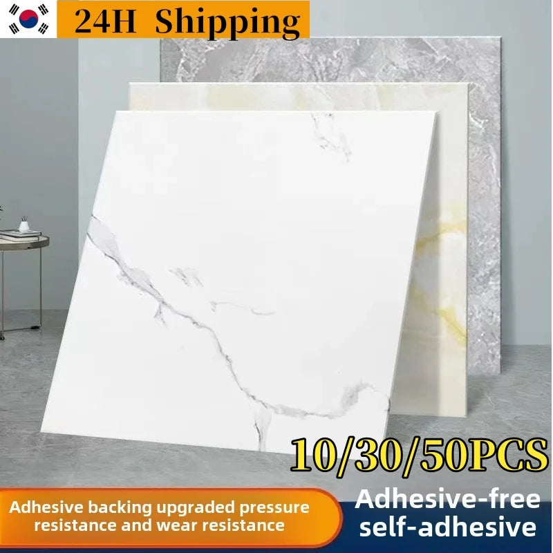 Ba tấm gạch men vuông xếp chồng, màu trắng vân xám, vàng nhạt và xám đá cẩm thạch.