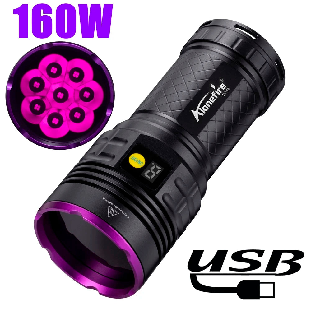 Đèn pin 160W màu đen, viền tím, nút on/off vàng, sạc USB, màn hình hiển thị số.