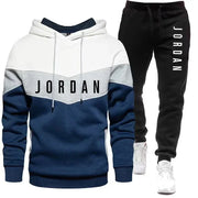 Áo hoodie xanh trắng xám chữ "JORDAN", quần jogger đen chữ "JORDAN".