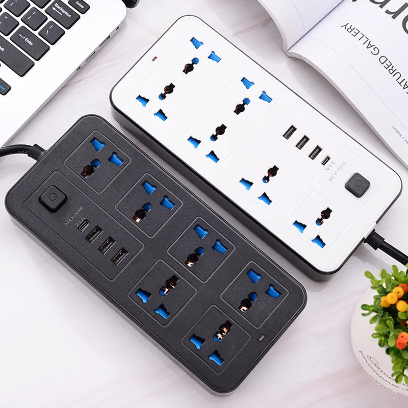 Hai ổ cắm điện, một màu trắng và một màu đen, có cổng USB và công tắc bật/tắt.