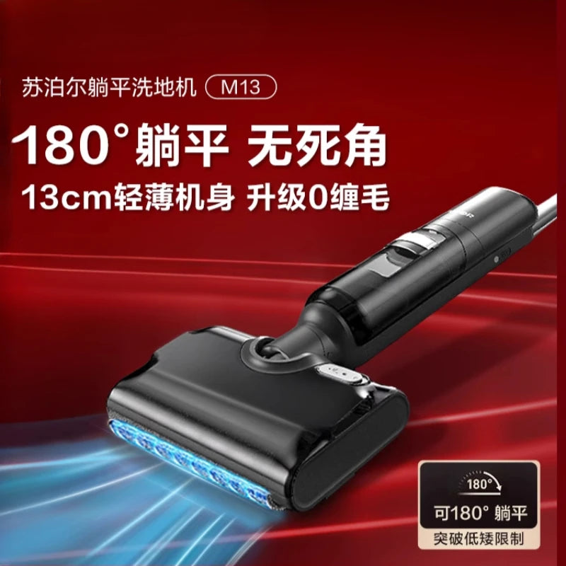 Máy hút bụi màu đen trên nền đỏ, có đèn LED xanh và chữ tiếng Trung Quốc.