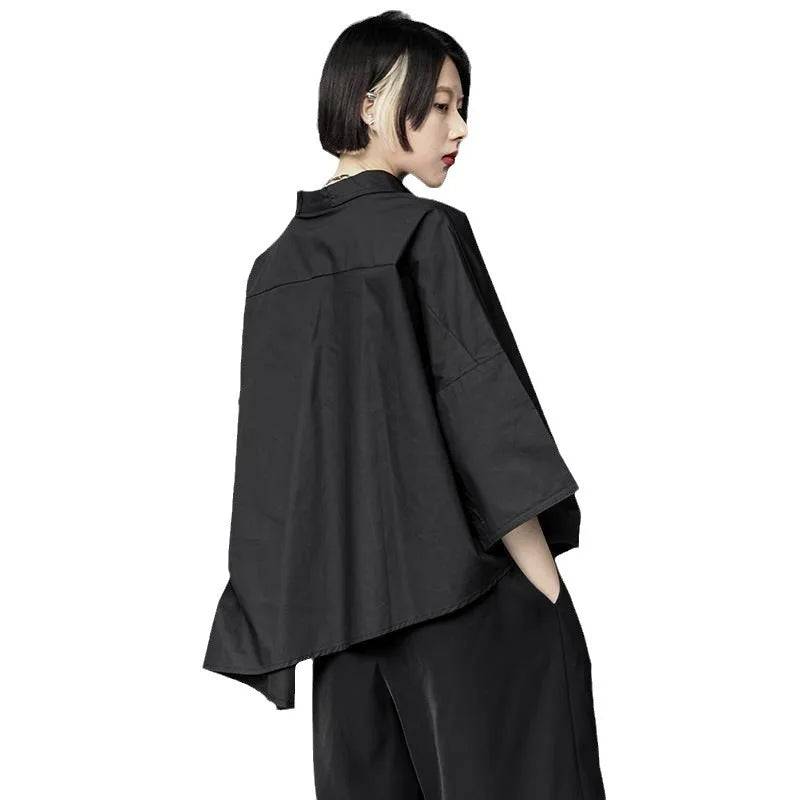 Áo Sơ Mi Nữ 2025: Tay Lỡ, Vạt Bất Đối Xứng, Màu Trơn