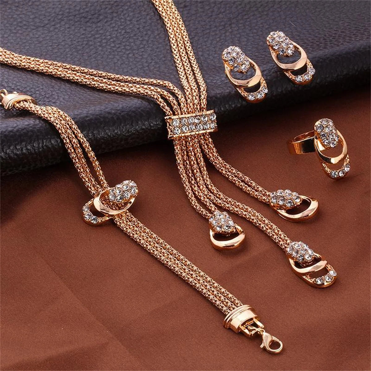 4-Piece Gold Jewelry Set: Ring, Necklace, Bracelet, Earrings