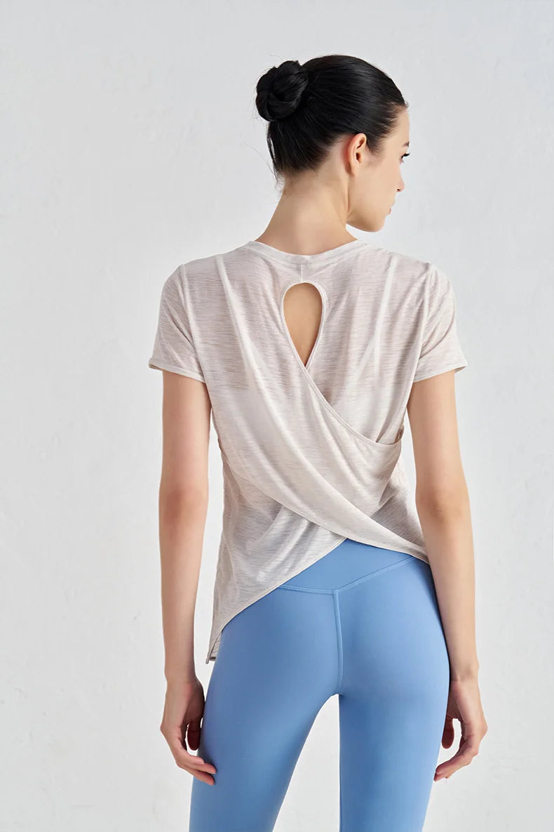 Áo Tập Gym Nữ Nylon Thoáng Mát Lưng Rỗng Ngắn Tay - Daisan Mart
