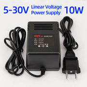 Bộ nguồn điện áp tuyến tính đen, dây cắm, chữ xanh 5-30V, công suất 10W.