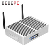 Máy tính mini màu bạc có hai ăng-ten, nhiều cổng USB và khe tản nhiệt.