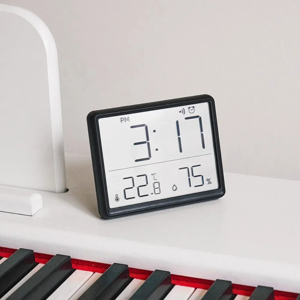 Ultra-thin multi-function digital alarm clock with magnetic sensor