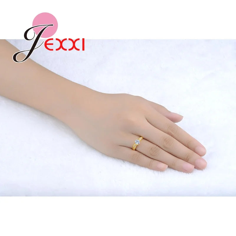 Gold Wedding Rings with Sparkling Crystals