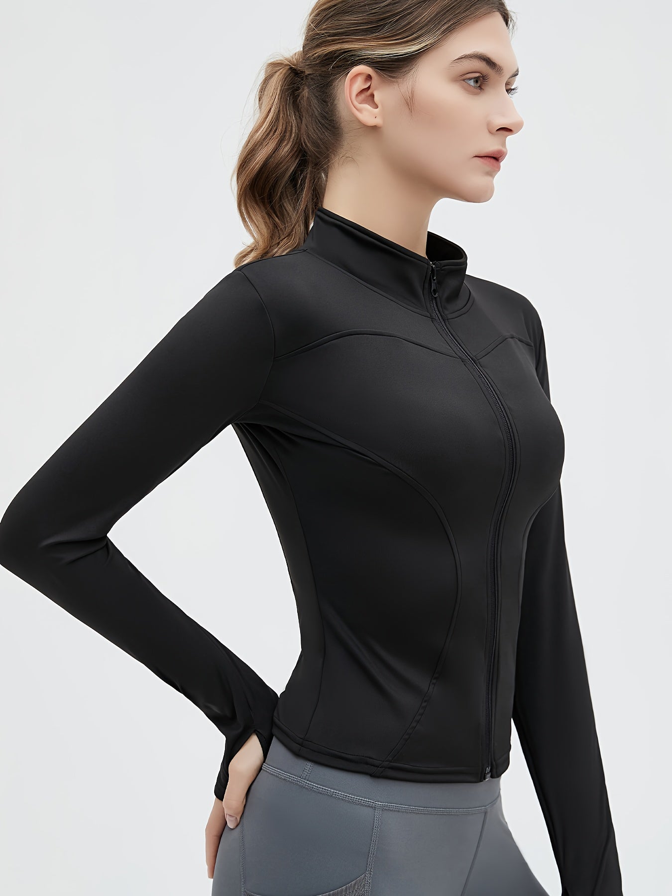 Women's Sports Jacket: Zip Turtleneck &amp; Fingerholes