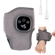 Băng điện xám có màn hình hiển thị số, kèm cáp USB, quấn quanh cổ chân.
