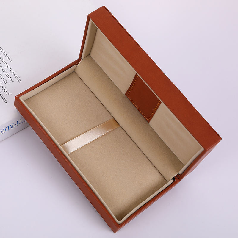 Golden brown leather pen box, velvet lining, embossed logo, high-end gift, seamed packaging, simple classic design, high-end luxury 
